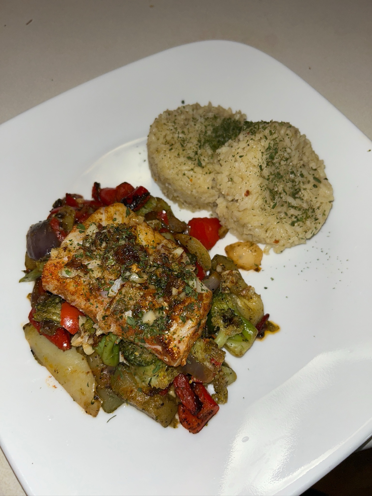 Pan Seared White Fish over Sautéed Vegetables and Cilantro Lime Rice